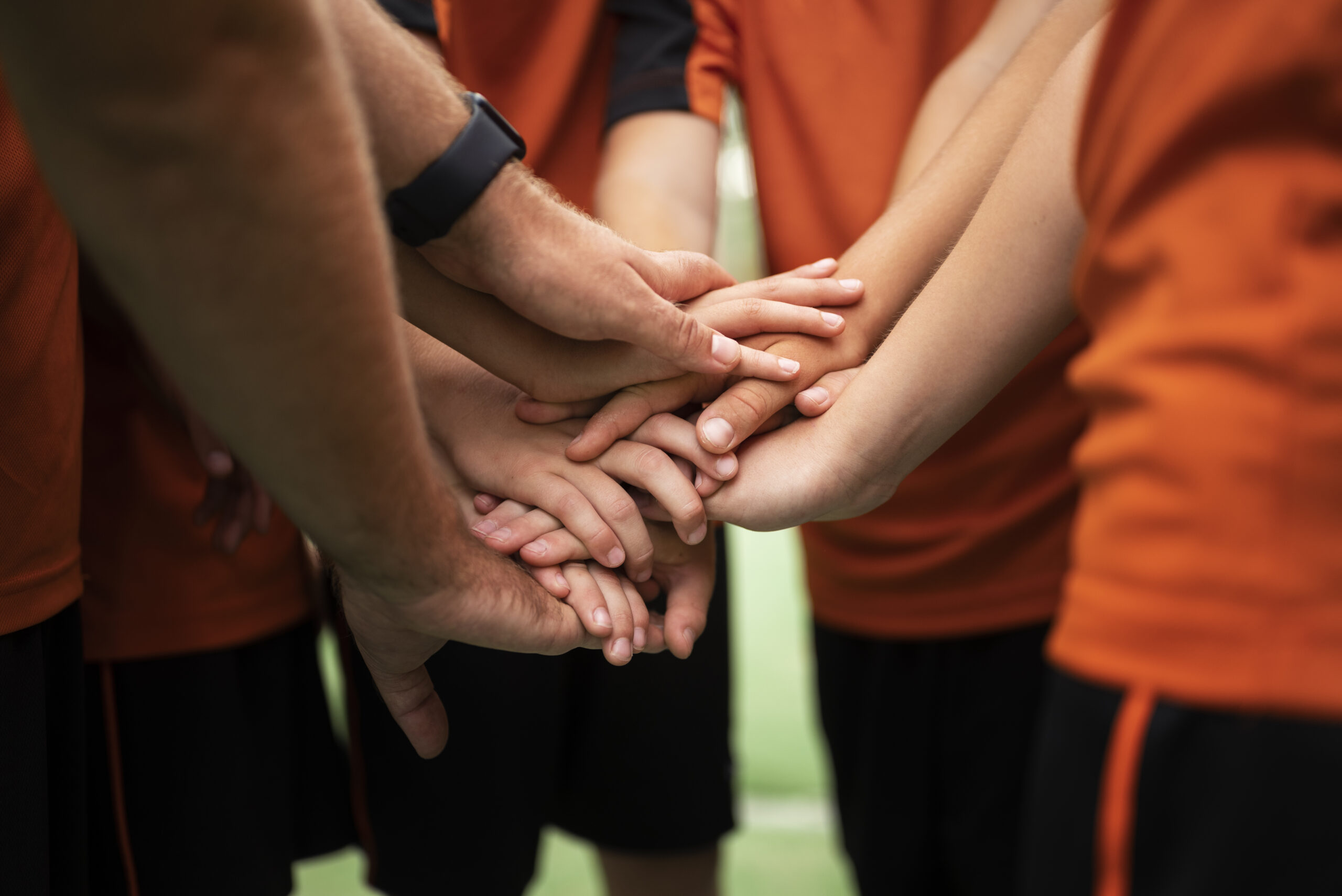 football-trainer-teaching-his-pupils